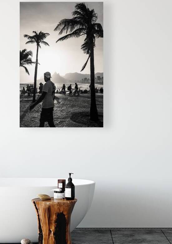 Black and white photo of people strolling along the promenade at Ipanema Beach in Rio de Janeiro  by caladoart
