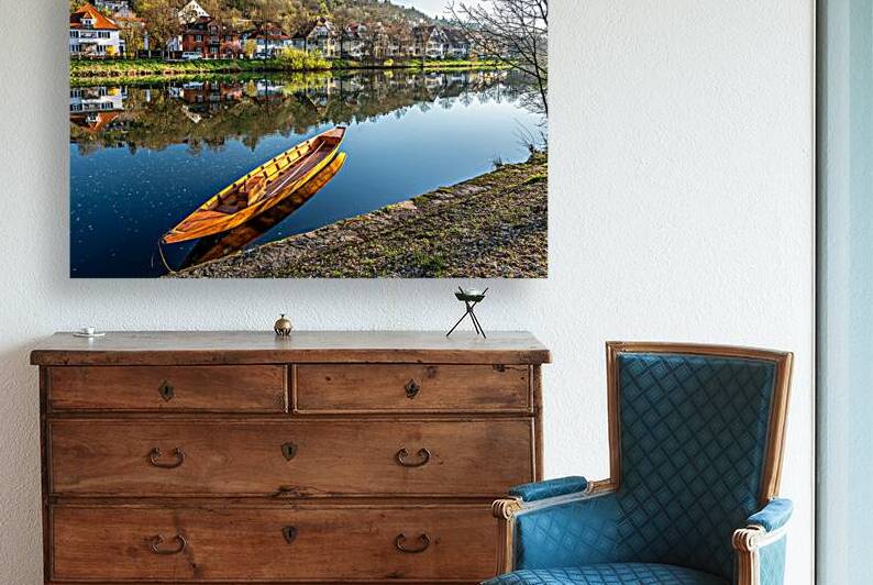 Traditional punt boat on the Neckar River in Tübingen on a clear spring morning  by caladoart