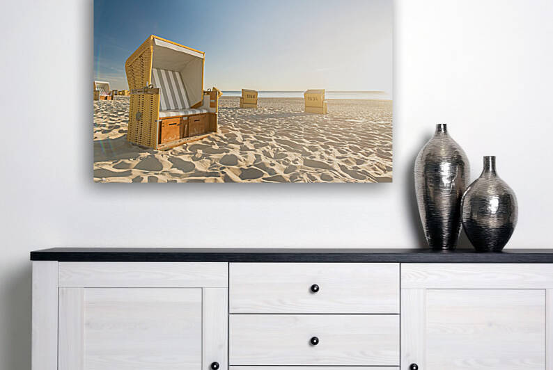 Beach chairs at sunset on the island of Sylt North Sea by caladoart