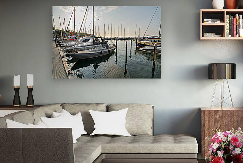 Sailing boats in a marina Langballigau during sunset at the Baltic Sea in Northern Germany by caladoart