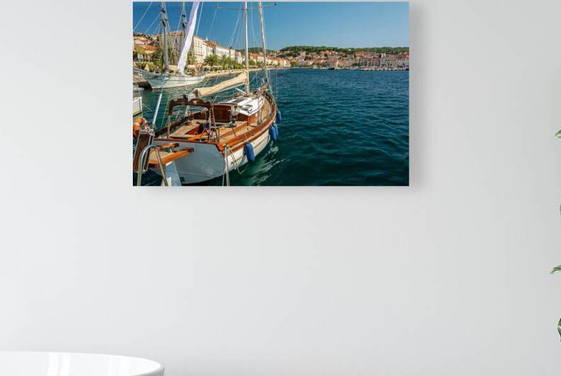 Luxurious sailing yacht in the harbour of Mali on the island of Losinj in the Adriatic Sea Croatia by caladoart