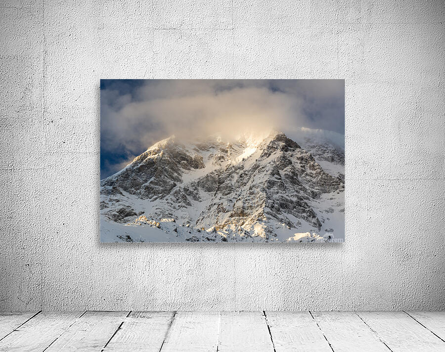 Sun rays shining through the clouds on a gorgeous morning at the Ortler Mountain in South Tyrol  Wall Preview