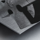 Monumental Majesty: Exploring the Modern Stone Cross Sculpture Metal print