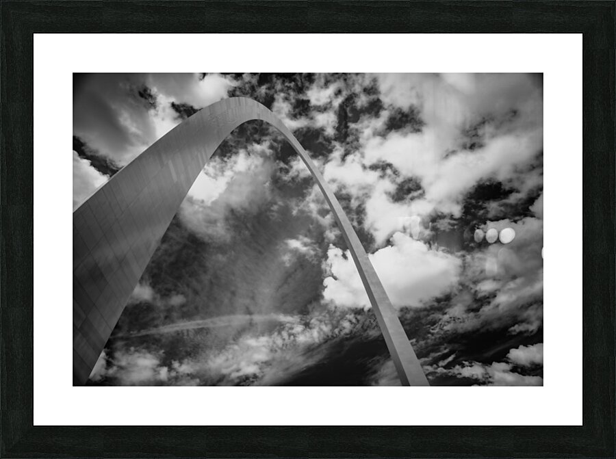 Sculpted Arch Amidst Dynamic Clouds Picture Frame print