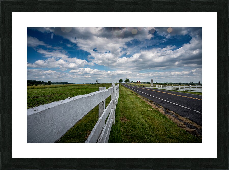 Fence along the road Picture Frame print