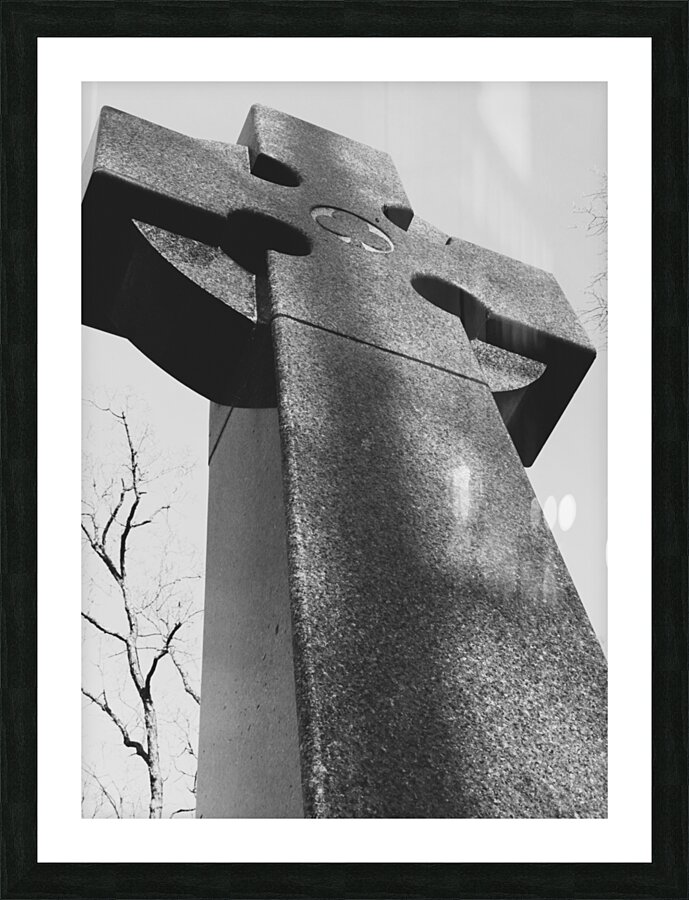 Monumental Majesty: Exploring the Modern Stone Cross Sculpture Picture Frame print
