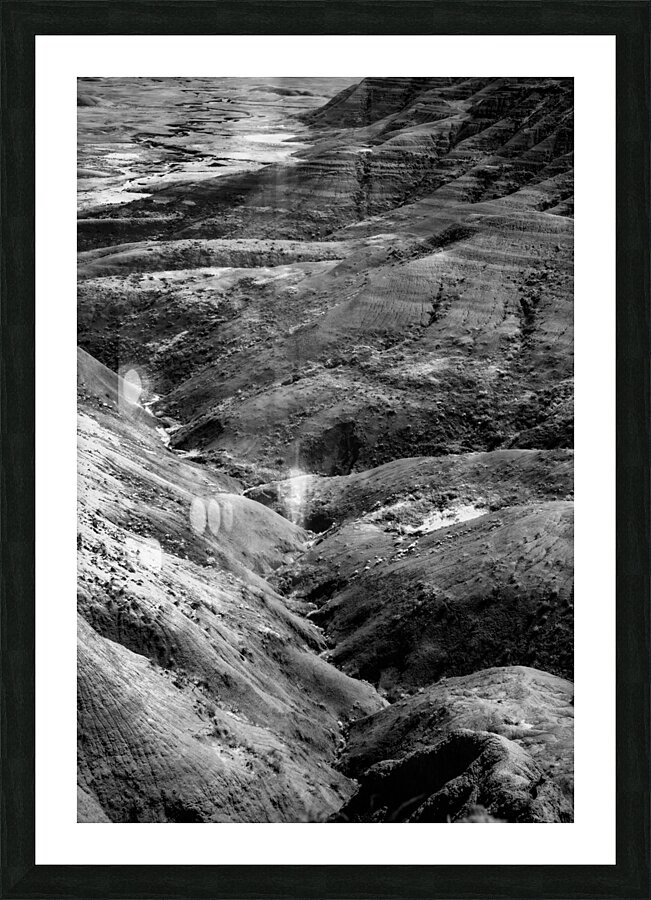 Shadows of the Earth: Eroded Beauty in the Badlands Picture Frame print