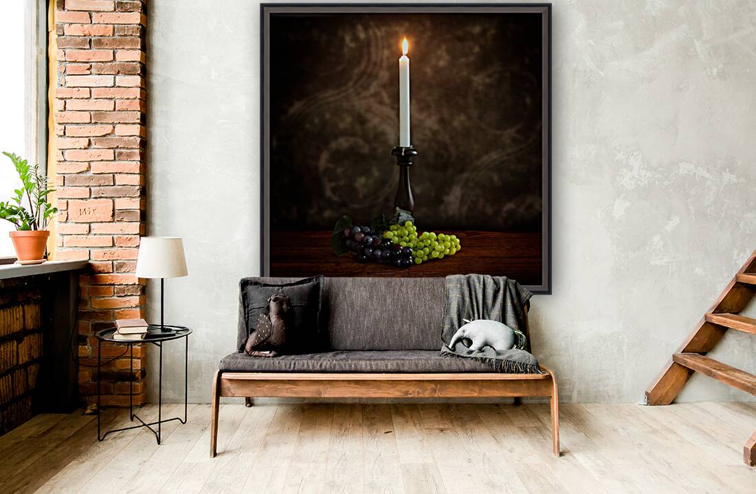 Vintage Illumination: Antique Candlestick with Grapes and Flame Reproduction