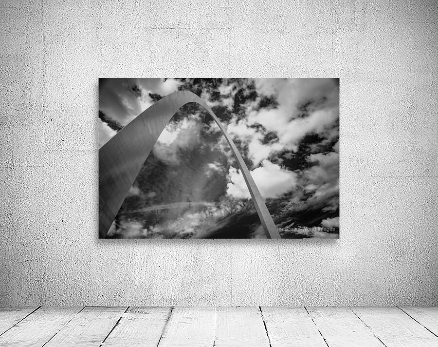 Sculpted Arch Amidst Dynamic Clouds Wall Preview