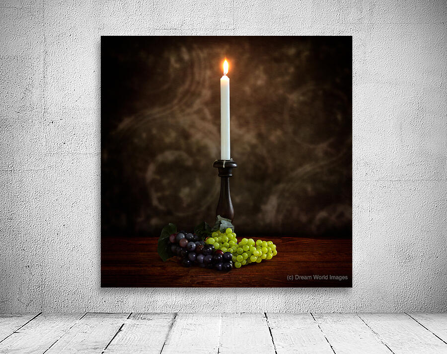 Vintage Illumination: Antique Candlestick with Grapes and Flame Wall Preview