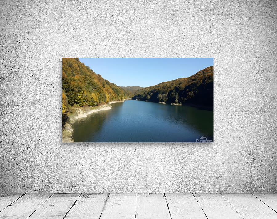 A stunning landscape of mountains trees and green leaves with water - Romania Wall Preview