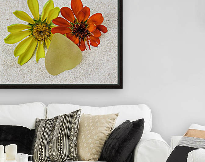 Pale yellow sea glass and zinnias by Photography by Janice Drew