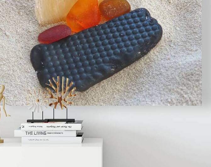 Black and orange sea glass  by Photography by Janice Drew