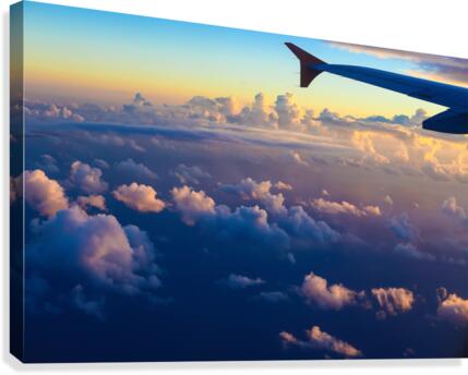 airplane wing setting sunset sky Canvas Print