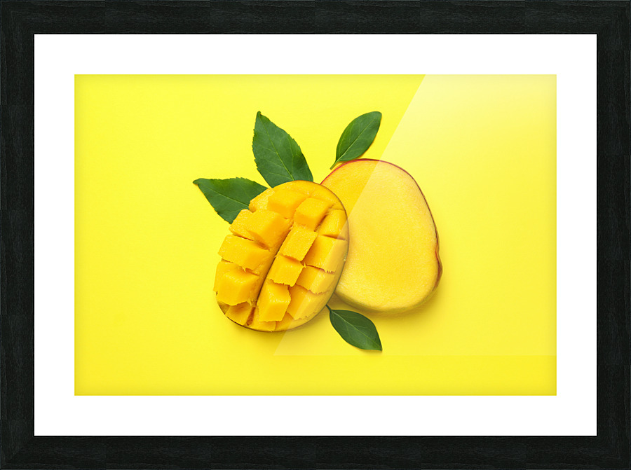 ripe mango fruit yellow background close up Picture Frame print