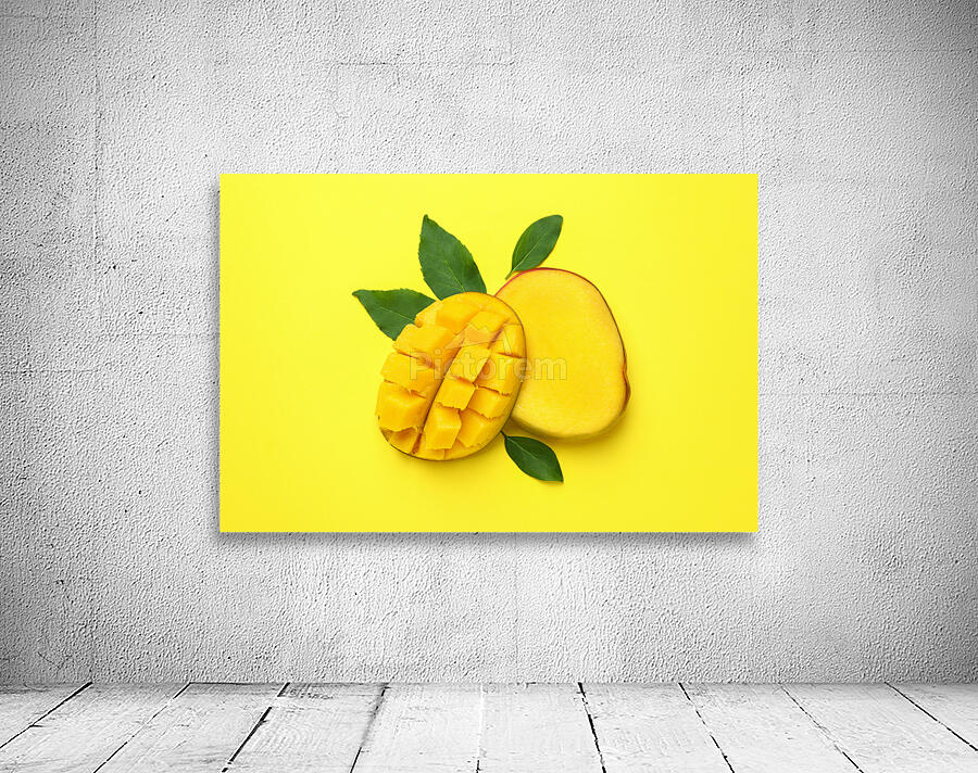 ripe mango fruit yellow background close up Wall Preview