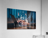 a person using a laptop at a table a stock photo Acrylic Print