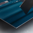 a person using a laptop at a table a stock photo Metal print