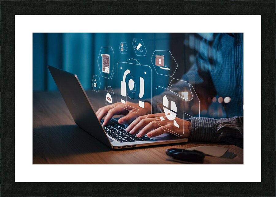 a person using a laptop at a table a stock photo Picture Frame print