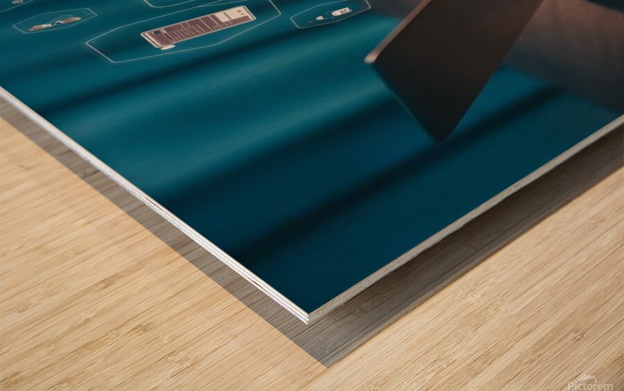 a person using a laptop at a table a stock photo Wood print