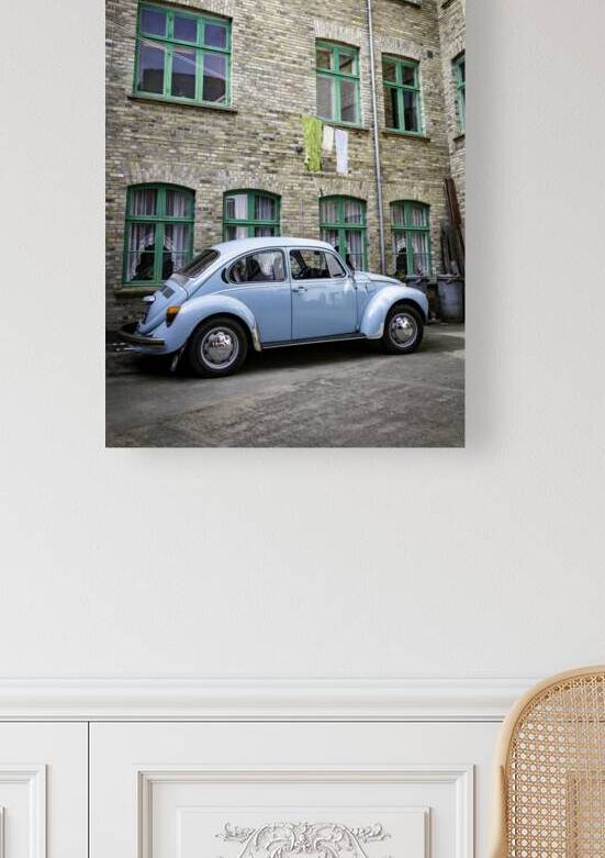 Retro Blue Classic Car Parked Beside Brick Building by Chris Willemsen