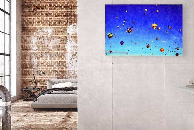 Colorful hot air balloons floating in a clear blue sky by Gestalt Imagery