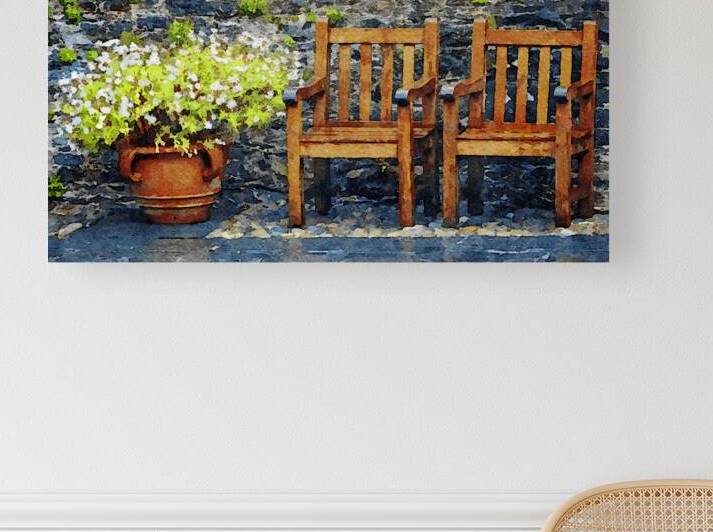 Rustic garden scene with wooden chairs and vibrant flowers by Gestalt Imagery