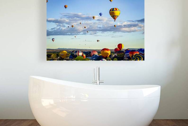 Hot air balloons ascending at a large festival by Gestalt Imagery