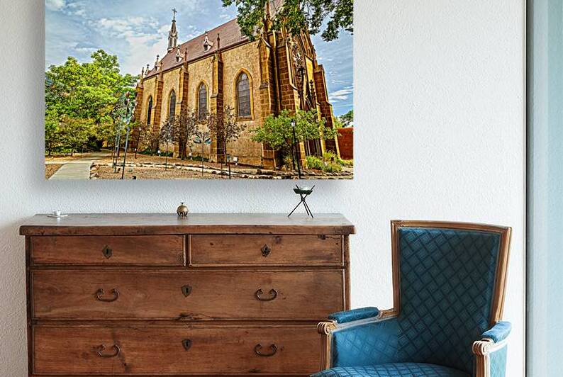 Loretto Chapel in Santa Fe under a vibrant and clear blue sky by Gestalt Imagery