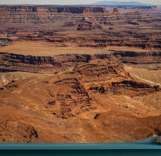 Majestic red rock canyons under a clear blue sky at Dead Horse P by Gestalt Imagery