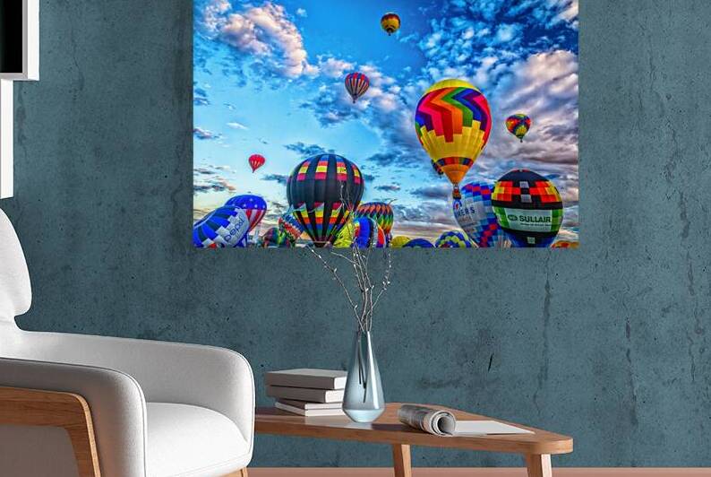 Colorful Hot Air Balloons Floating in Cloudy Blue Sky by Gestalt Imagery