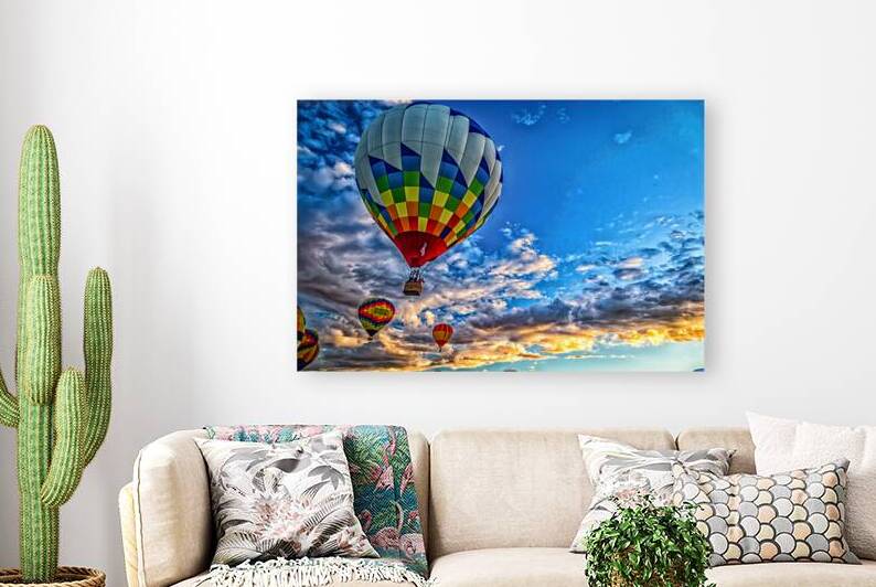 Hot Air Balloon Floating in a Blue and Gold Sky by Gestalt Imagery