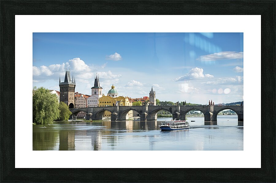 Touristic boat near the Charles bridge in Prague. Picture Frame print