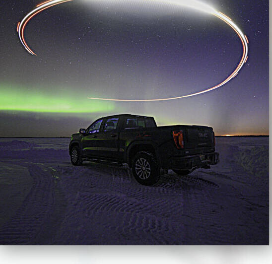 Aurora Illuminated: Capturing the Northern Lights with Drone Light Painting by Dre Erwin Photography