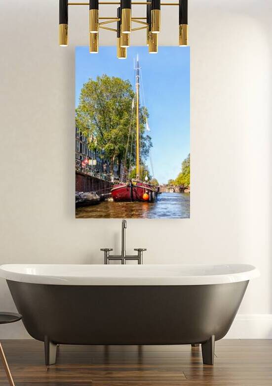 Sailing barge on the Prinsengracht canal Amsterdam Netherlands by Kevin Hellon