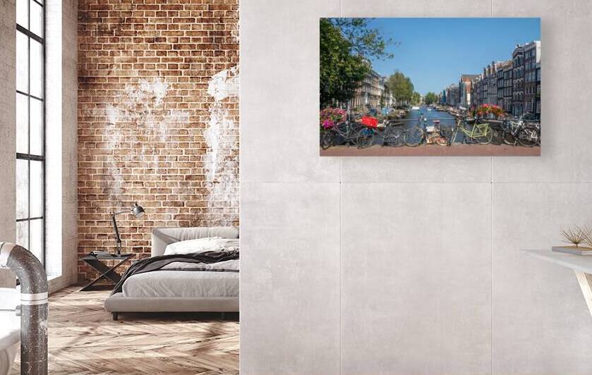 Bicycles on a bridge over the Prinsengracht Amsterdam Netherlands by Kevin Hellon