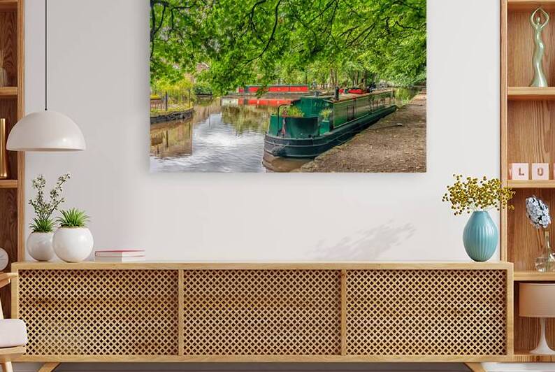 Canal boats moored in Uppermill canal basin on the HUddersfield Narrow Canal Oldham England UK by Kevin Hellon