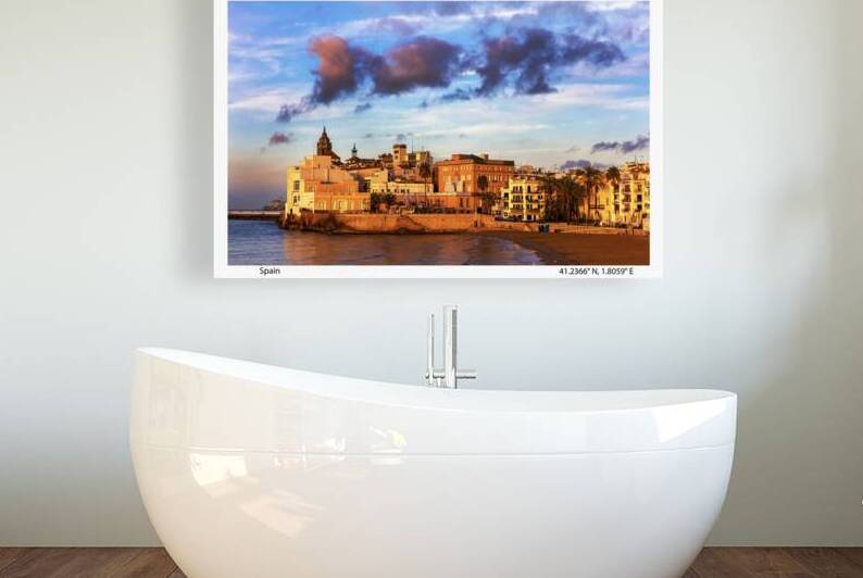 Travel PosterView of Sitges Spain basking in the early morning  by Kevin Hellon