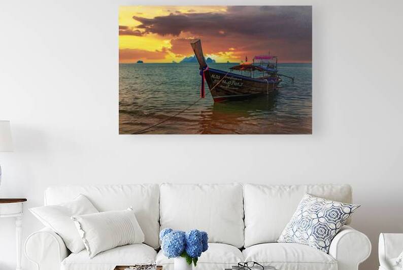Long tail boat moored at sunset on Ao Nang Beach Krabi Thailan by Kevin Hellon