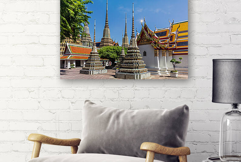 Stupas in Wat Pho Bangkok Thailand by Kevin Hellon
