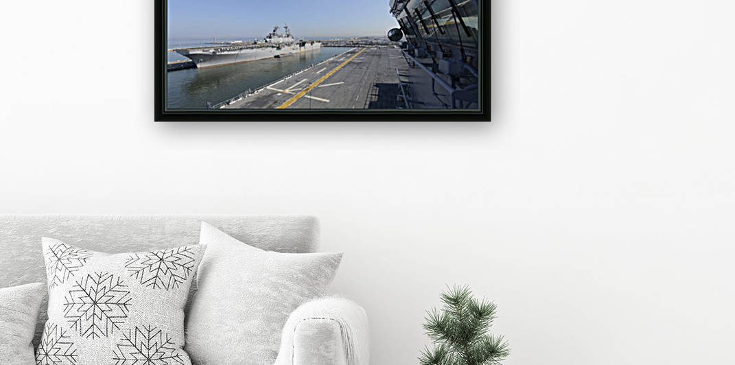 USS Kearsarge and USS Bataan moored. by StocktrekImages
