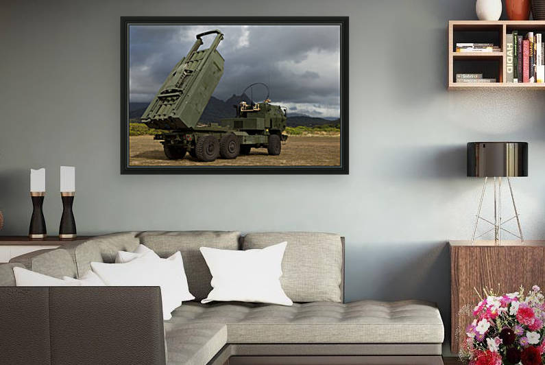 A M142 High Mobility Artillery Rocket System. by StocktrekImages