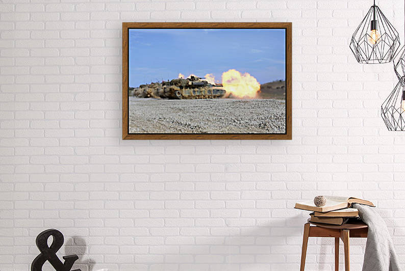 M1A1 Abrams fire their 120mm smoothbore cannon. by StocktrekImages