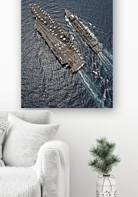 Aerial view of aircraft carrier USS Ronald Reagan and USNS Bridge during a replenishment at sea. by StocktrekImages