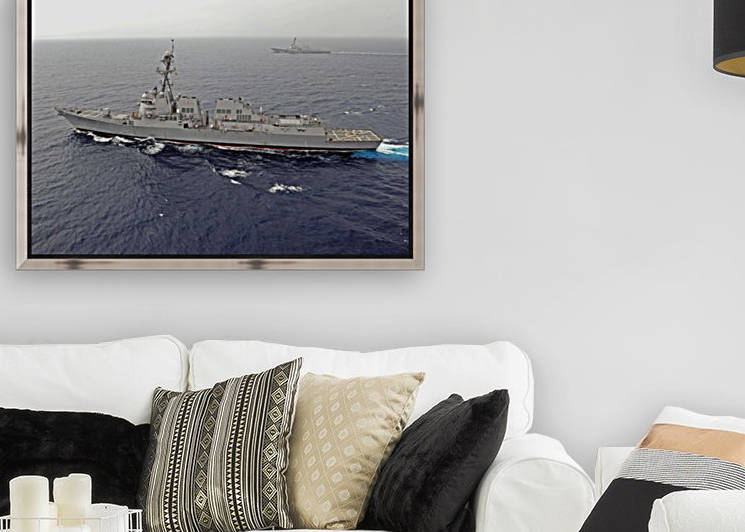 Guided missile destroyers USS Dewey and USS Pinckney transit the South China Sea. by StocktrekImages