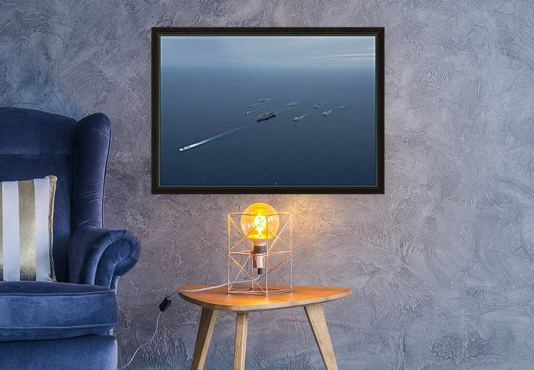 Carrier Strike Group formation of ships in the Bay of Bengal. by StocktrekImages