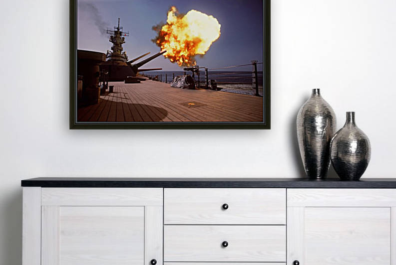 Battleship USS Wisconsin fires one of the Mark 7 16-inch-50-caliber guns. by StocktrekImages