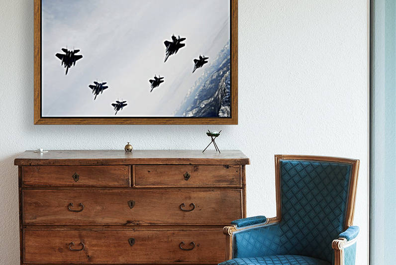 A six-ship formation of aircraft fly over the Sawtooth Mountains in Idaho. by StocktrekImages