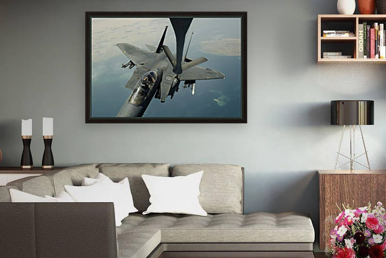 An F-15E Strike Eagle receives fuel from a KC-135R Stratotanker. by StocktrekImages