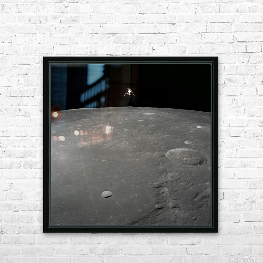 The Apollo 12 lunar module Intrepid is set in a lunar landing ...